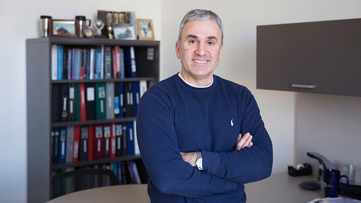 Konstantinos Serfes in his Drexel University office