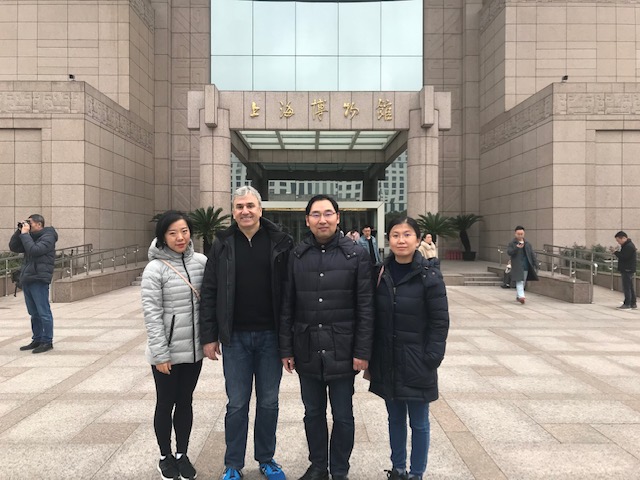 With my former Ph.D. students Prof. Suting Hong (far left) and Prof. Minghua Chen (far right), and Prof. Ji Wu (standing on my left), in Shanghai, China, during my 2019 visit to ShanghaiTech University at the invitation of Prof. Suting Hong.
