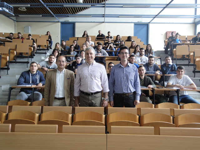 Fulbright Intercountry Lecturing Award: A lecture to undergraduate students at the Democritus University of Thrace, Greece, 2019. The Chair of the Department of Economics, Prof. Konstantinos Hazakis, is on my right and Prof. George Geronikolaou is on my left.